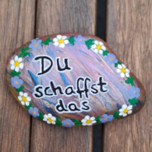 Du schaffst das Spruchstein, pinkmetallicfarbener Stein mit Blumenbordüre rundherum