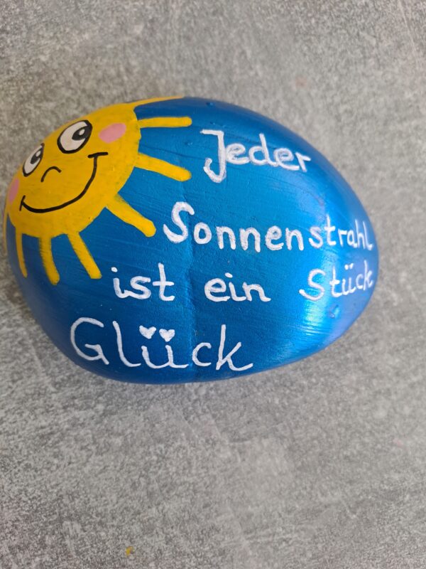 Sonnenstrahlen Spruchstein mit dem Text Jeder Sonnenstrahl ist ein Stück Glück