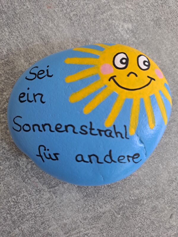 Sonnenstrahlen Spruchstein mit dem Text Sei ein Sonnenstrahl für andere