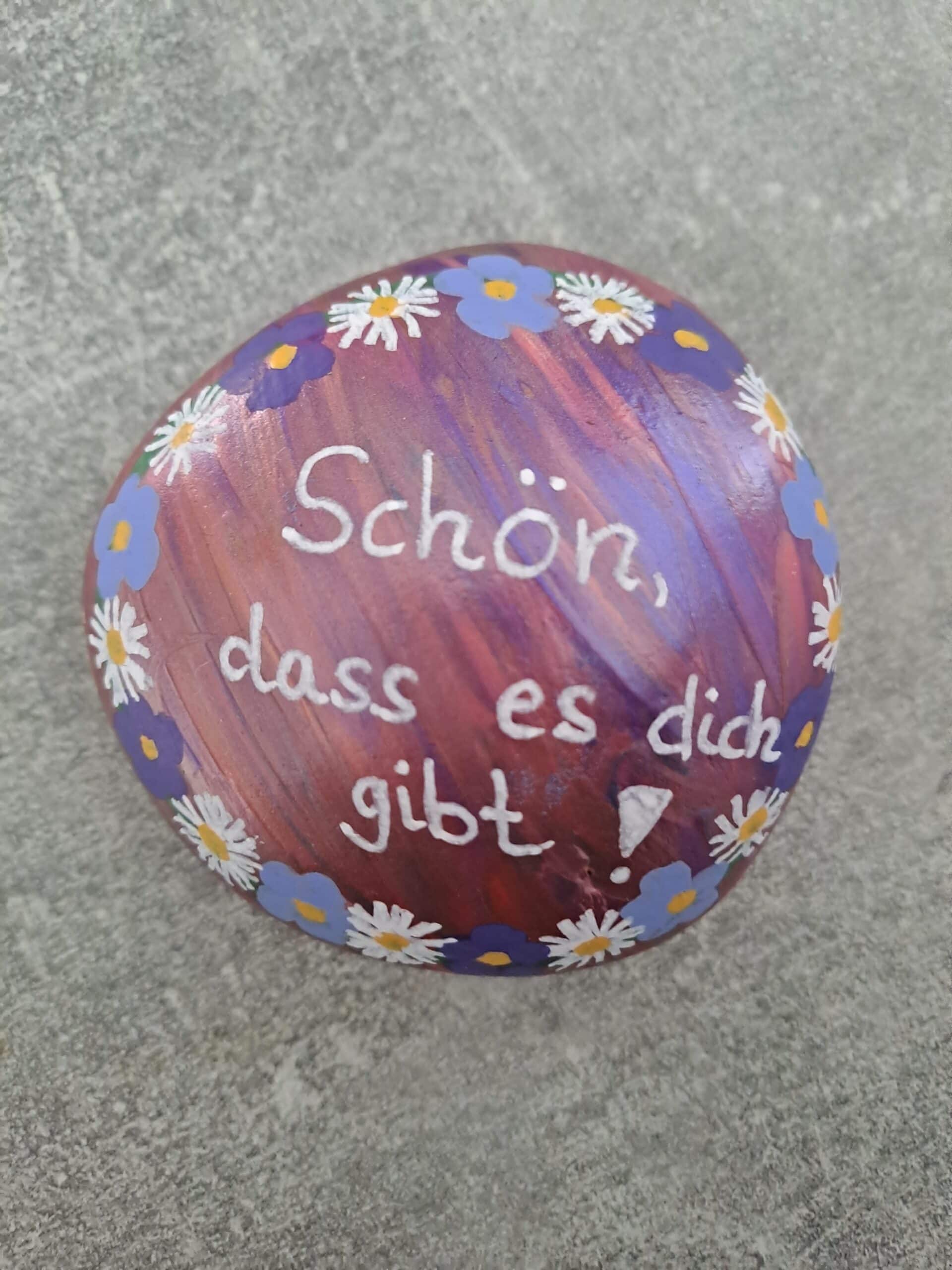 Schön, dass es dich gibt Spruchstein in pinkmetallic mit Blumenbordüre rundherum